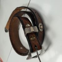 CS827/2024  BROWN BELT WITH SILVER STAR ON IT